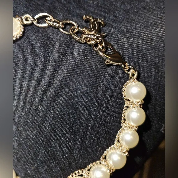 Gold-Tone Pearl Bracelet with Crystallized Logo Pendant - Picture 5 of 7